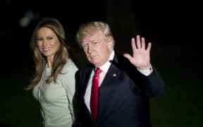 US President Donald Trump and First Lady Melania walk to the White House from Marine One after their nine-day tour to the Middle East and Europe.