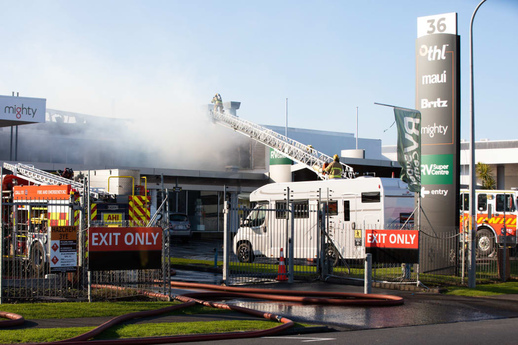 Firefighters battle a blaze that broke out at Maui campervan rental facility in Māngere, South Auckland on the morning of 3 September.