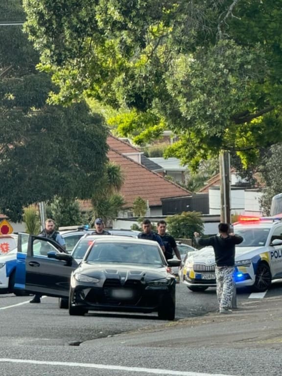 A witness said four young-looking men exited the vehicle with their hands raised.