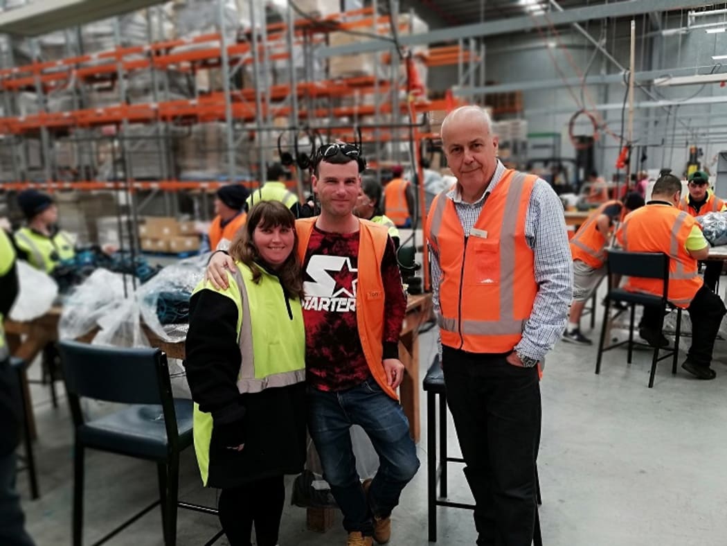 Martin Wylie with workers in the Altus Enterprises factory in Papatoetoe