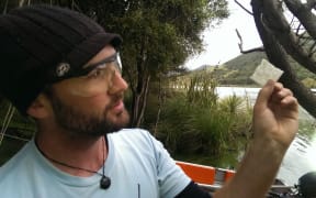 Jonathan Puddick from the Cawthron Institute inspects frozen bacterial colonies.