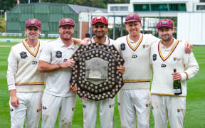 Northern Districts players celebrate winning the 2024/25 Plunket Shield.