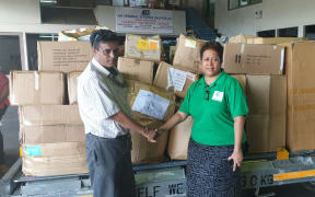 Mohinesh Narayan a Customs Fiji Clearance agent and Millie Lakokinakeba of Empower Development Fiji