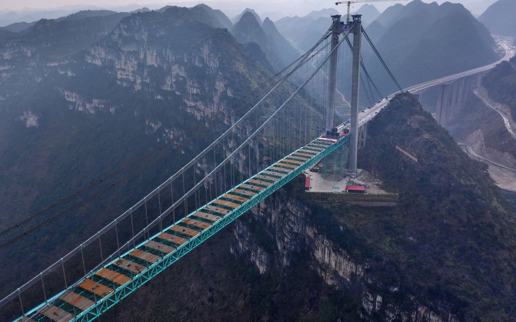 Aerial view of a construction site at the Huajiang Grand Canyon Bridge taken on January 17.