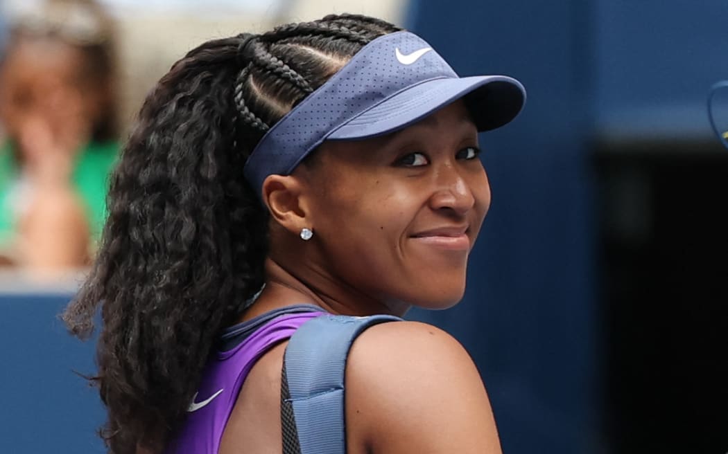 Japan's Naomi Osaka leaves the court after her victory over USA's Hailey Baptiste at the conclusion of their women's singles second round tennis match on day five of the US Open tennis tournament at the USTA Billie Jean King National Tennis Center in New York City, on August 28, 2025. (Photo by TIMOTHY A.CLARY / AFP)