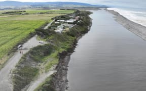 An aerial view of Bluecliffs, perched next to the Waiau River and ocean.