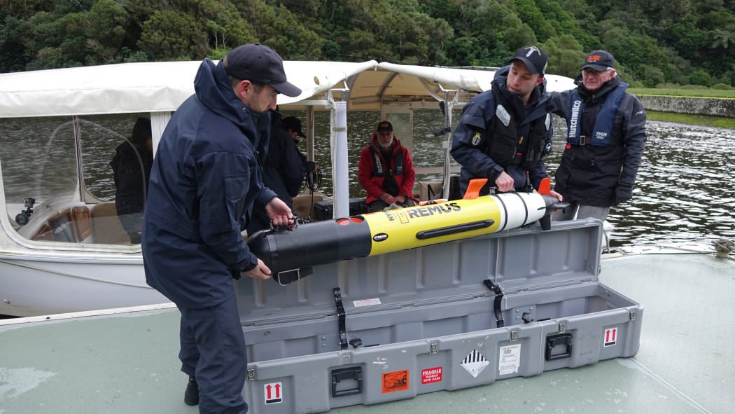The Remus 100, which weighs more than 100kg and has a price tag of $500,000, is being used to explore the bottom of the lake at Wellington's Zealandia.