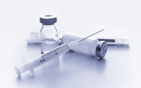Medical ampoules and syringe.