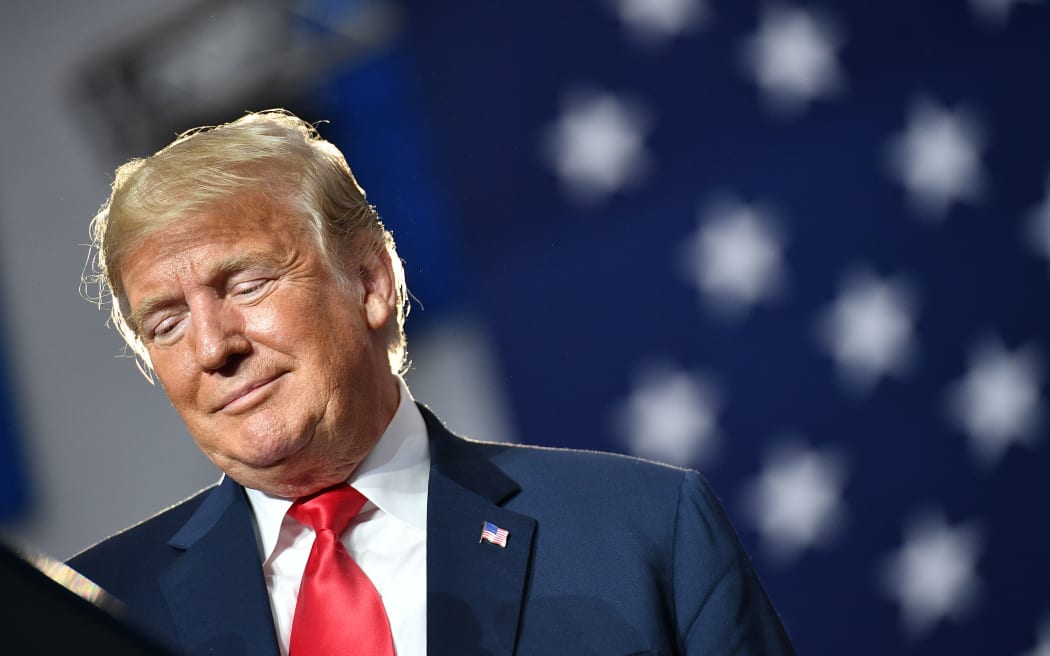 US President Donald Trump speaks during a rally at Olentangy Orange High School in Lewis Center, Ohio, on August 4, 2018.