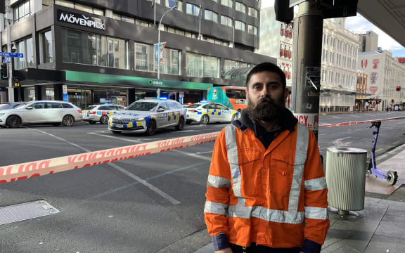 A worker outside the building where this morning's fatal shooting in downtown Auckland happened says terrified people fled from inside. Naveen Kumar and his team were providing traffic management services for the construction work that was going on there.