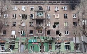 Damaged building in Mariupol as a Russian ultimatum for Ukrainian fighters in the city to surrender expires.