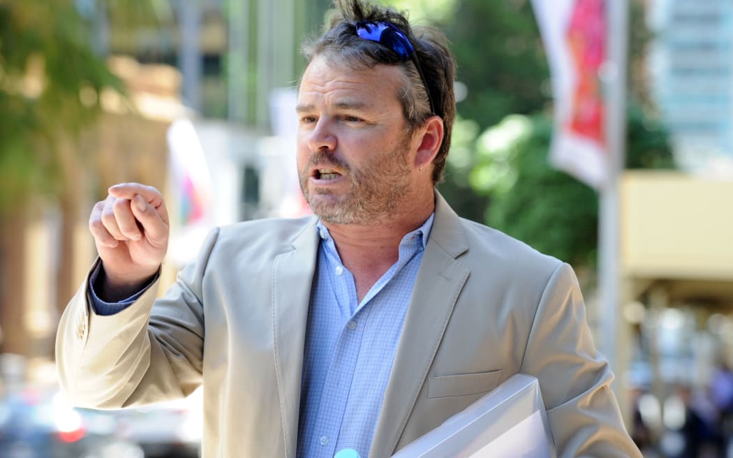 Chairman of the Party for Freedom Nicholas Folkes arrives at the Supreme Court in Sydney, Friday, Dec. 4, 2015. The Party for Freedom group is planning a rally to mark the 10th anniversary of the Cronulla riots.