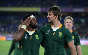 Siya Kolisi - South Africa captain celebrates with Eben Etzebeth following victory over Wales 2019.