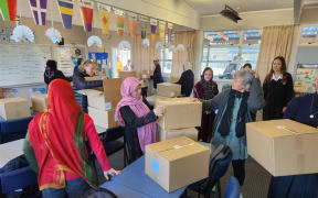 More than a hundred care packages have been given out to refugees thanks to three Auckland high school students.