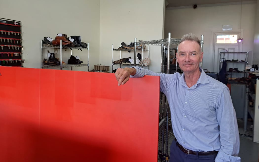 David Yeates, owner of Expert Shoe Repair on Karangahape Road for 25 years, said he felt business had slowed down since bus lane signs were installed.
