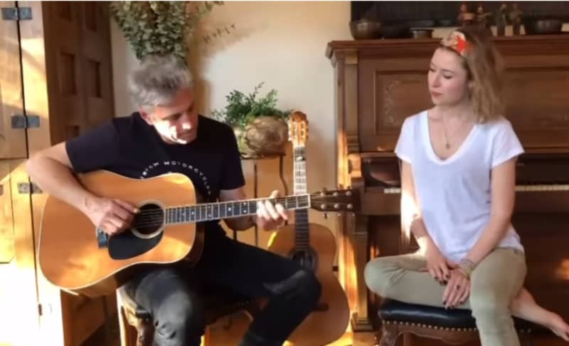 A screenshot of an Instagram video posted by Kiwi singer Hayley Westenra of herself singing with Thomas Deluca playing a guitar.