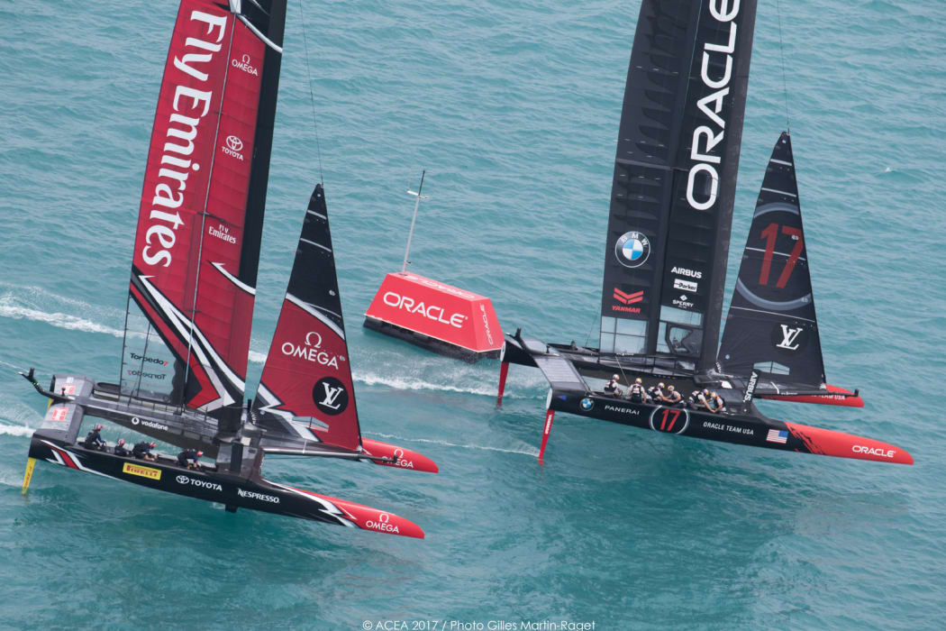 Emirates Team New Zealand and Oracle Team USA racing during the Louis Vuitton America's Cup Qualifiers at the 35th America's Cup, Bermuda, 2017.