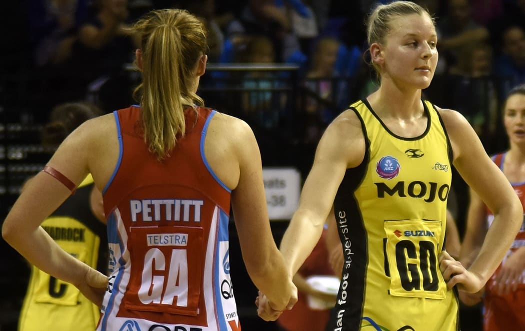 Pulse captain Katrina Grant shakes the hand of Swifts' Susan Pettitt