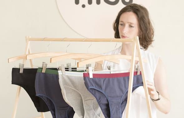 Elisha Watson, founder of Wellington social enterprise Nisa, with some organic cotton products