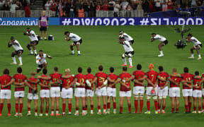 Fiji's players led by Fiji's outside centre and captain Waisea Nayacalevu (L) perform the 'Cibi' ahead of the France 2023 Rugby World Cup Pool C match between Fiji and Portugal at the Stade de Toulouse in Toulouse, southwestern France on October 8, 2023. (Photo by Valentine CHAPUIS / AFP)