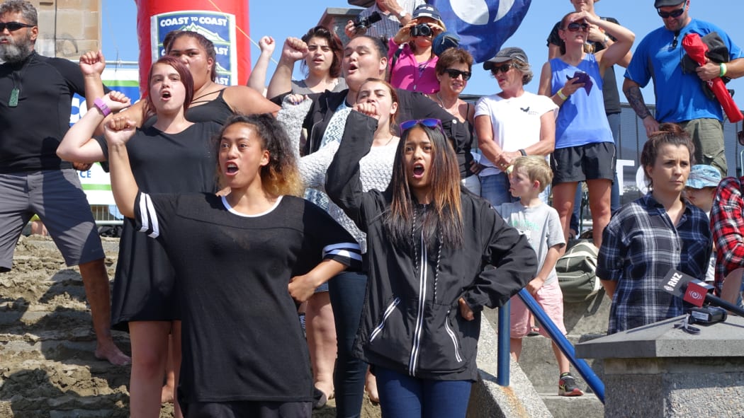 Supporters of Aranui students who finished the Coast to Coast perform haka in their honour.