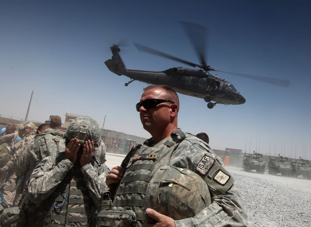 File photo showing US forces in southern Afghanistan in 2010, where a Black Hawk helicopter is lifting off from Camp Nathan Smith in Kandahar city.