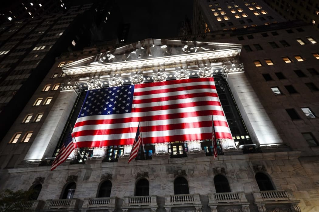 A view of the New York Stock Exchange in Wall Street with US national flag on Election Day.