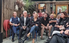Eastern district police commander Superintendent Jeanette Park, left, and Police Minister Stuart Nash, second left, listen to Hawke's Bay residents at a meeting on safety after Cyclone Gabrielle, Tuesday 28 February 2023.