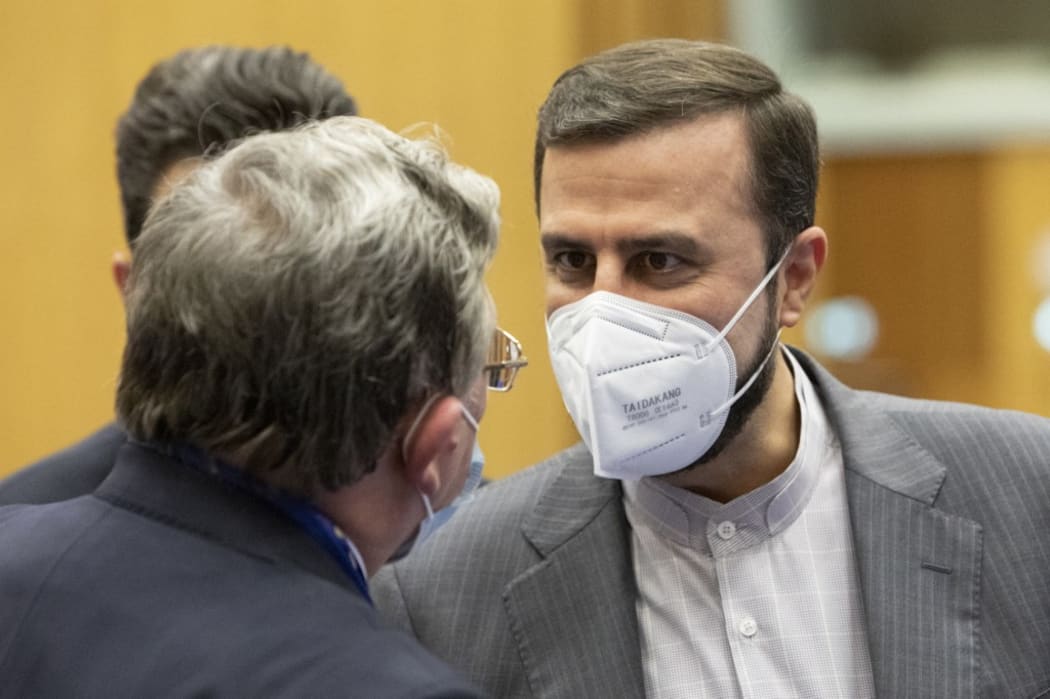 Iran's Governor to the International Atomic Energy Agency (IAEA), Kazem Gharib Abadi (R) , during a meeting of the IAEA Board of Governors at the agency's headquarters in Vienna, Austria, on September 13, 2021.