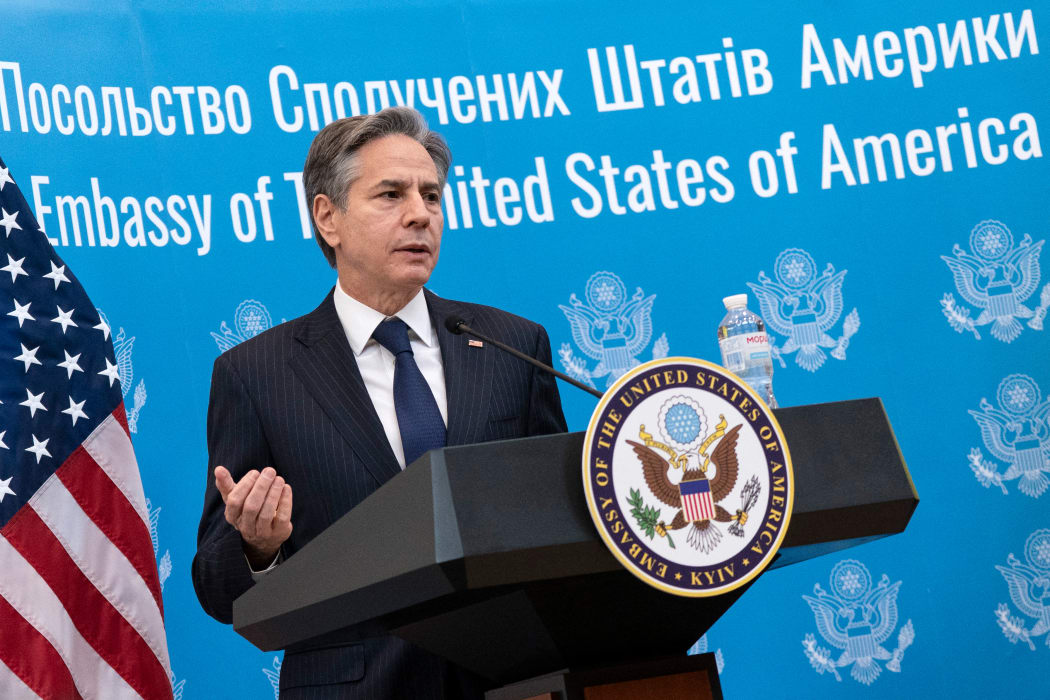 US Secretary of State Antony Blinken greets embassy staff at the US embassy in Kyiv on 19 January 2022 as part of a two-day visit in Ukraine.