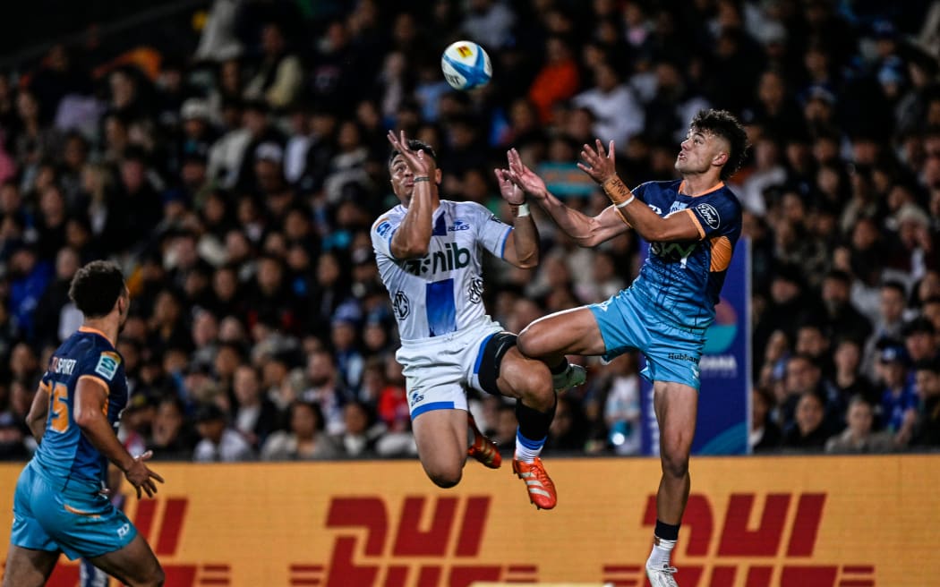 Caleb Clarke of the Blues and Kyren Taumoefolau of Moana Pasifika, Moana Pasifika v Blues, round 14 of the Super Rugby Pacific competition at North Harbour Stadium, Auckland, New Zealand on Saturday 17 May 2025. © Photo: Andrew Cornaga / Photosport
