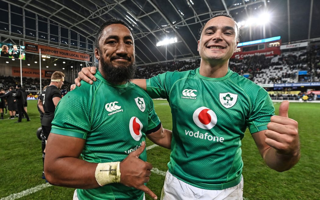 Bundee Aki and James Lowe celebrate Ireland's win over the All Blacks, Dunedin 2022.