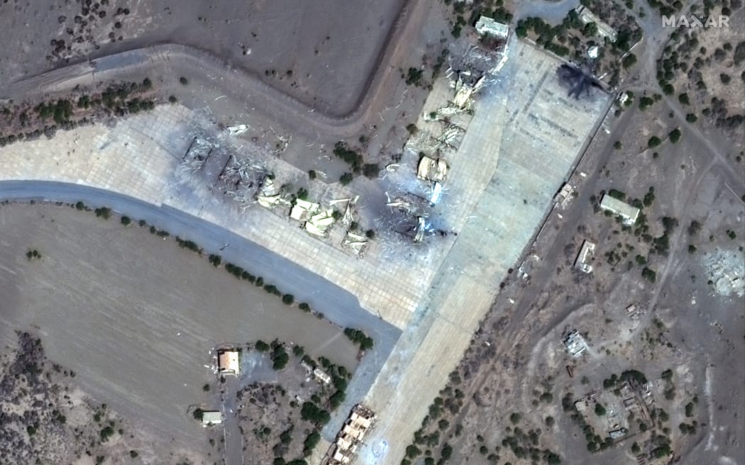 This handout satellite picture courtesy of Maxar Technologies shows destroyed shelters in Hodeida airfield, in Hodeida, Yemen on January 12, 2024, after airstrikes by the United States and Britain. Yemen's Huthis launched an anti-ship ballistic missile on January 12, 2024 in retaliation for overnight American and British strikes targeting the Iran-backed rebels, a US general said.  The assessment of damage from the strikes by the United States and Britain -- which targeted nearly 30 locations using more than 150 munitions -- is still ongoing, Sims said, noting however that the number of casualties is not expected to be high. (Photo by Satellite image ©2024 Maxar Technologies / AFP) / RESTRICTED TO EDITORIAL USE - MANDATORY CREDIT "AFP PHOTO / Satellite image ©2024 Maxar Technologies" - NO MARKETING NO ADVERTISING CAMPAIGNS - DISTRIBUTED AS A SERVICE TO CLIENTS