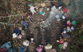 Children learning about how to light fires at the Bush Farm Education course.