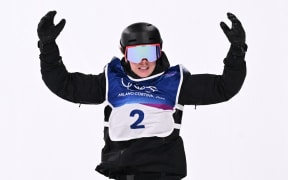 New Zealand's Zoi Sadowski Synnott reacts after competing in the snowboard women's big air final run 2 during the Milano Cortina 2026 Winter Olympic Games at Livigno Snow Park, in Livigno (Valtellina), on 9 February 2026.