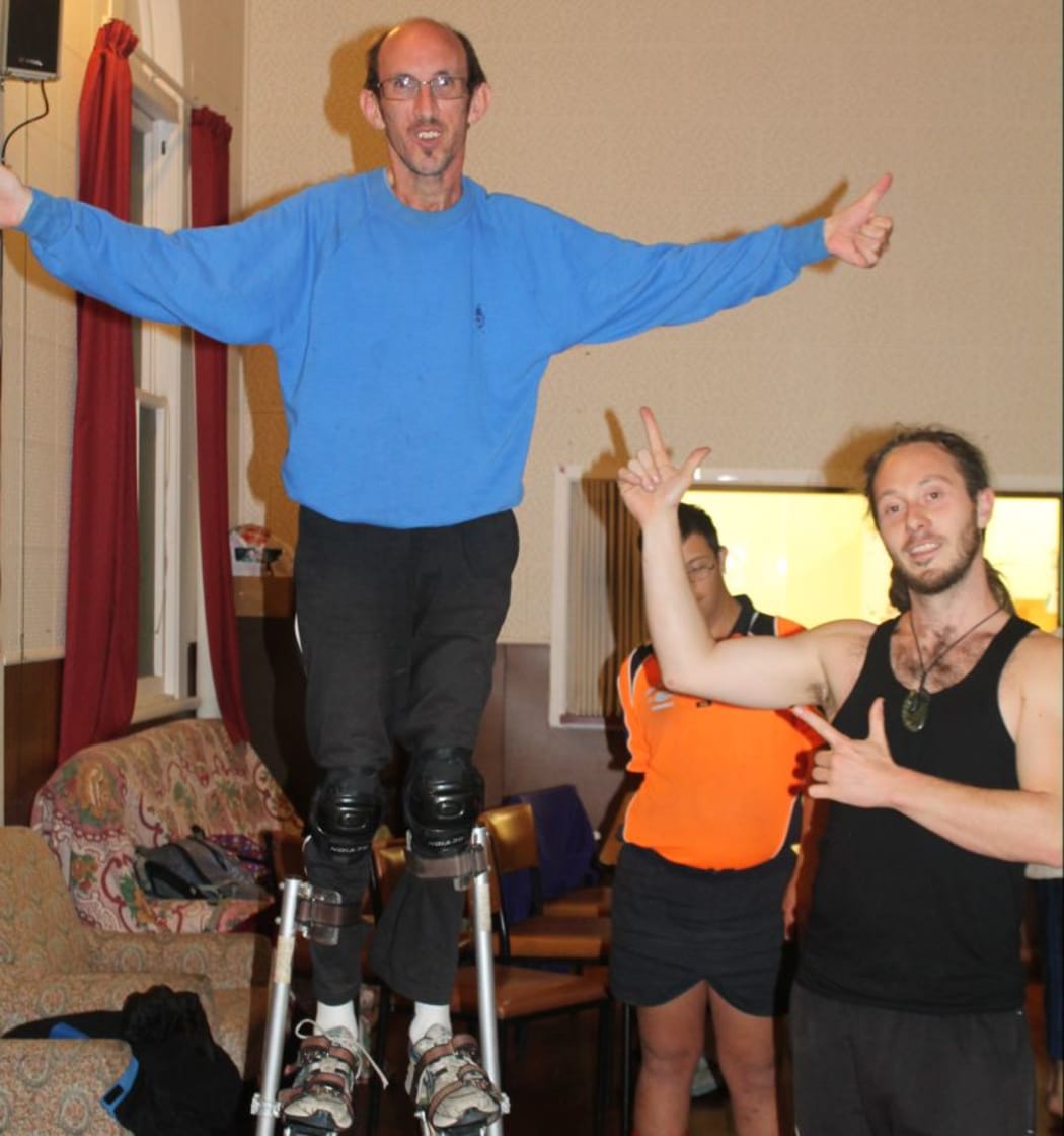 Ta-dah! Jason up on his stilts.