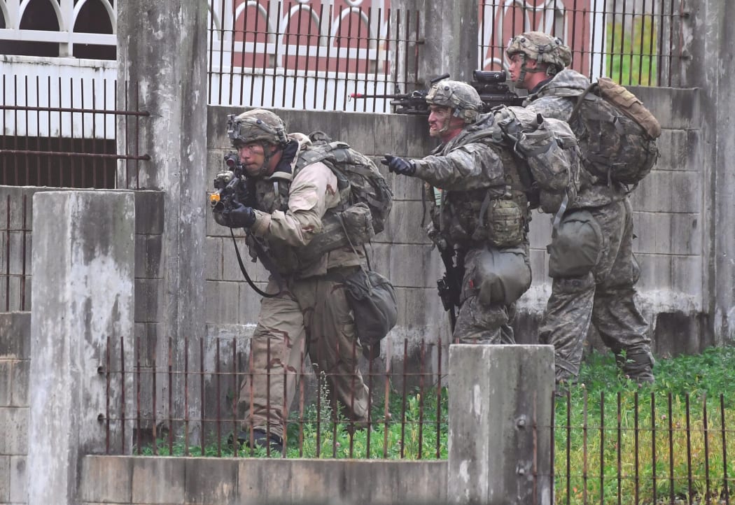 US soldiers participate in a South Korea-US combined arms collective training exercise at the US army's Rodriguez shooting range in Pocheon, about 70 km northeast of Seoul near the heavily-fortified border with North Korea on September 19, 2017.