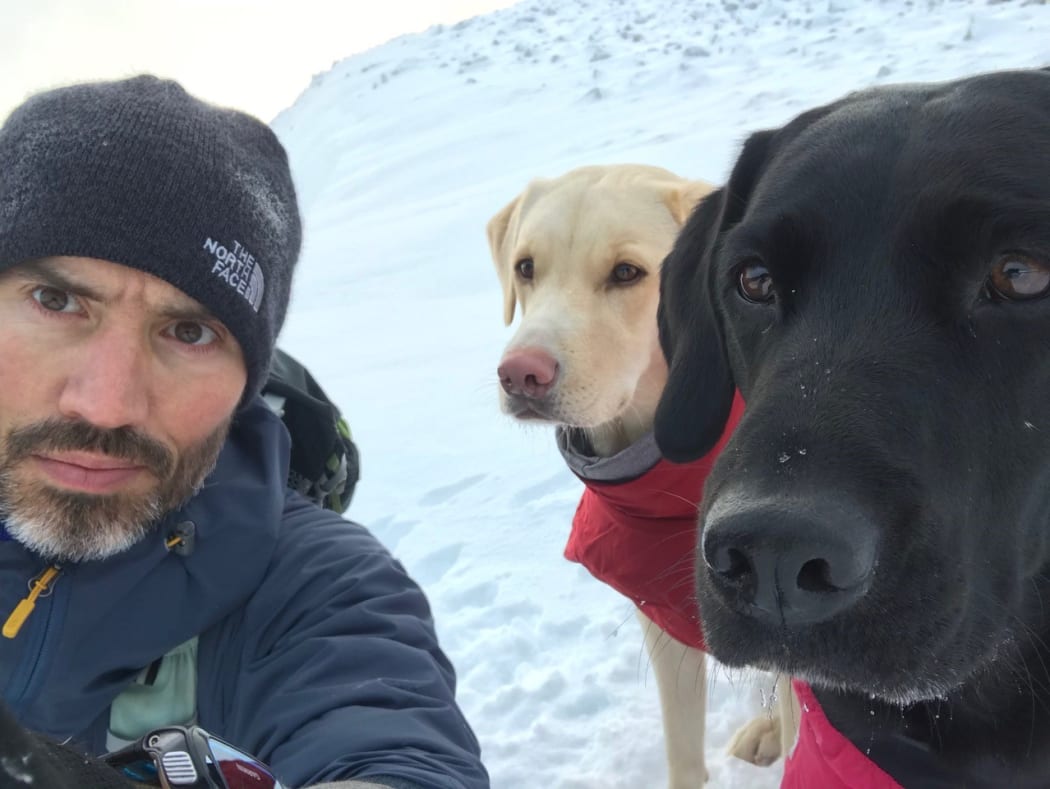 Andrew Cotter with Olive (r) and Mabel (l)