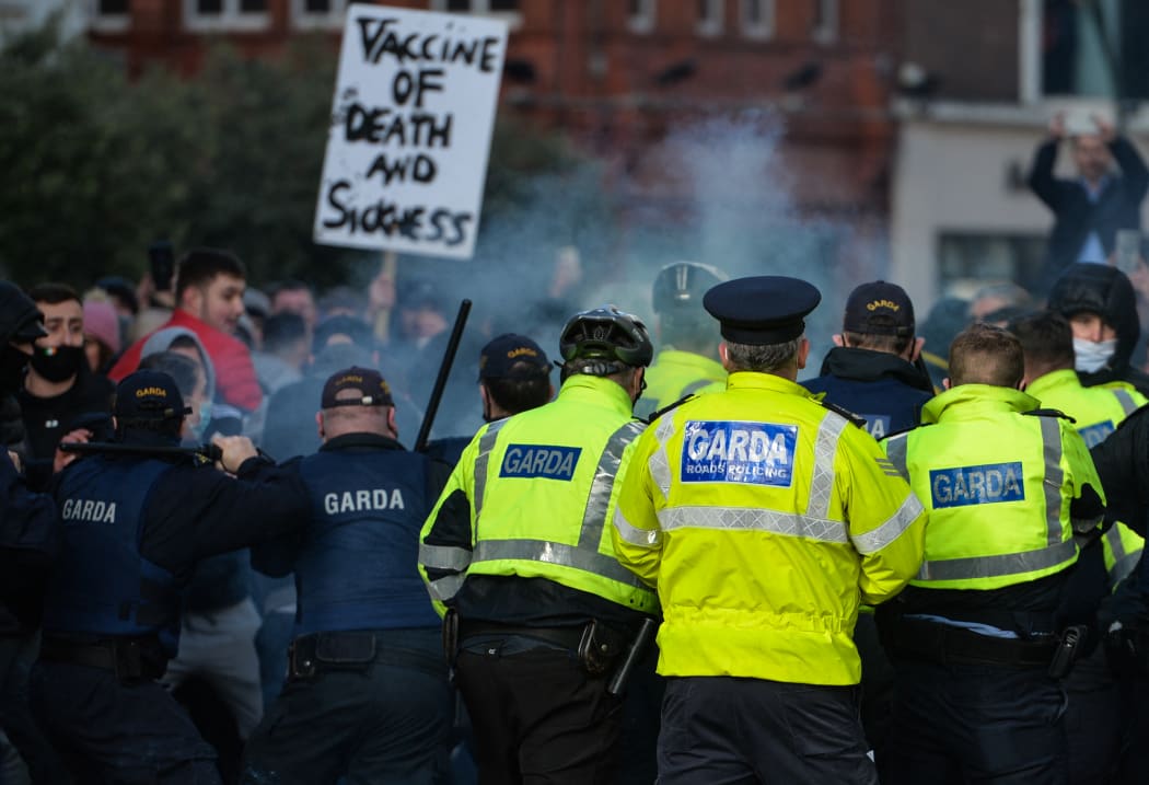A group of Anti-Lockdown protesters clash with Gardai (Irish Police) in Grafton Street, Dublin, during Level 5 Covid-19  lockdown.