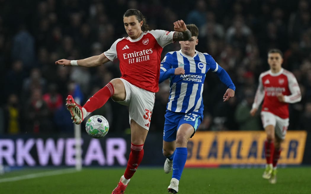 Arsenal defender Riccardo Calafiori controls the ball during the English Premier League football match against Brighton and Hove Albion in Brighton, March 4, 2026. (Photo by Glyn KIRK / AFP) / RESTRICTED TO EDITORIAL USE. NO USE WITH UNAUTHORIZED AUDIO, VIDEO, DATA, FIXTURE LISTS, CLUB/LEAGUE LOGOS OR 'LIVE' SERVICES. ONLINE IN-MATCH USE LIMITED TO 120 IMAGES. AN ADDITIONAL 40 IMAGES MAY BE USED IN EXTRA TIME. NO VIDEO EMULATION. SOCIAL MEDIA IN-MATCH USE LIMITED TO 120 IMAGES. AN ADDITIONAL 40 IMAGES MAY BE USED IN EXTRA TIME. NO USE IN BETTING PUBLICATIONS, GAMES OR SINGLE CLUB/LEAGUE/PLAYER PUBLICATIONS. /