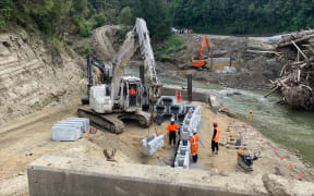 Construction taking place on the piers to support the SH2 Bailey bridge.