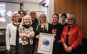 L - R: Karen Larsen (CFO); Ben Monkman (Sustainability coordinator); Irene Gardiner (RNZ Board); Rev Stephen King (Chair Living Wage Movement Aotearoa NZ); Leigh Friday (Sustainability Lead RNZ) Gina Lockyer (Executive Director Living Wage Movement Aotearoa NZ); Finn Cordwell (Organiser Living Wage Movement Aotearoa NZ); Muriel Tunoho (Local Board Member Living Wage Movement Aotearoa NZ)