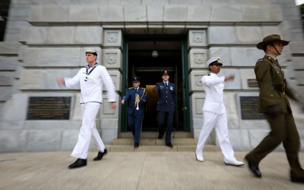 Soldiers exiting the National War Memorial in Wellington for the last post ceremony.