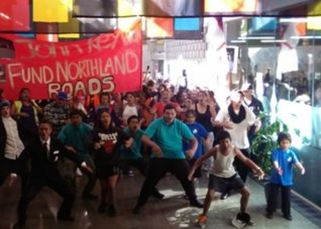Northlanders protesting logging trucks and dusty roads perform a thunderous haka  in foyer of the Whangarei council chambers.