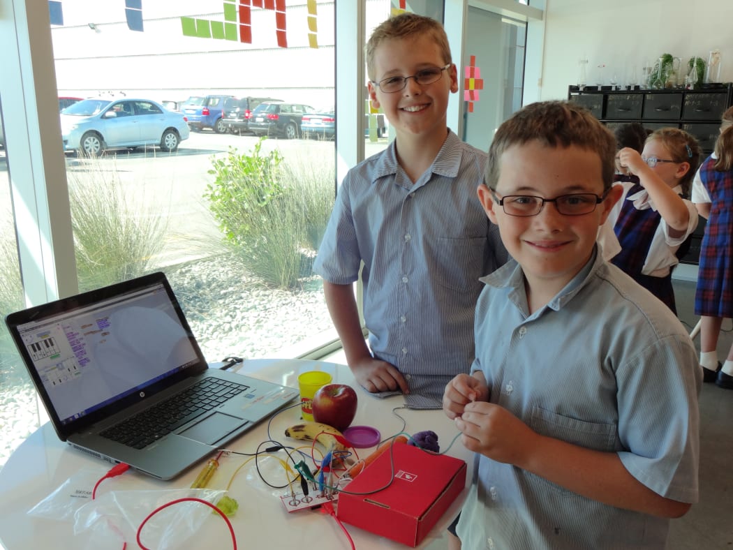 Apples, bananas and cabbage was all that these boys from St Theresa's school needed to create a musical instrument.