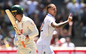 Brydon Carse of England celebrates taking the wicket of Alex Carey of Australia during the fourth test in Melbourne.