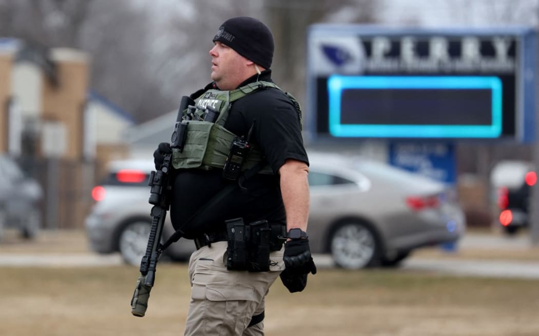 PERRY, IOWA - JANUARY 04: Police respond to a school shooting at the Perry Middle School and High School complex on January 04, 2024 in Perry, Iowa. Students were returning to classes today following the holiday break.   Scott Olson/Getty Images/AFP (Photo by SCOTT OLSON / GETTY IMAGES NORTH AMERICA / Getty Images via AFP)