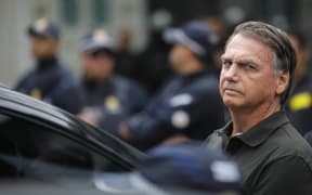 Former Brazilian President (2019-2022) Jair Bolsonaro leaves the DF Star hospital in Brasilia on September 14, 2025, after undergoing a series of medical examinations, as he remains under house arrest. Brazil's Supreme Court on September 11 sentenced firebrand ex-president Jair Bolsonaro to 27 years in prison for coup plotting at the end of a landmark trial that divided the nation and drew US fury. (Photo by Sergio Lima / AFP)