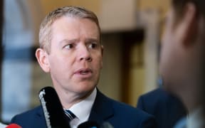 Prime Minister Chris Hipkins talks to journalists.