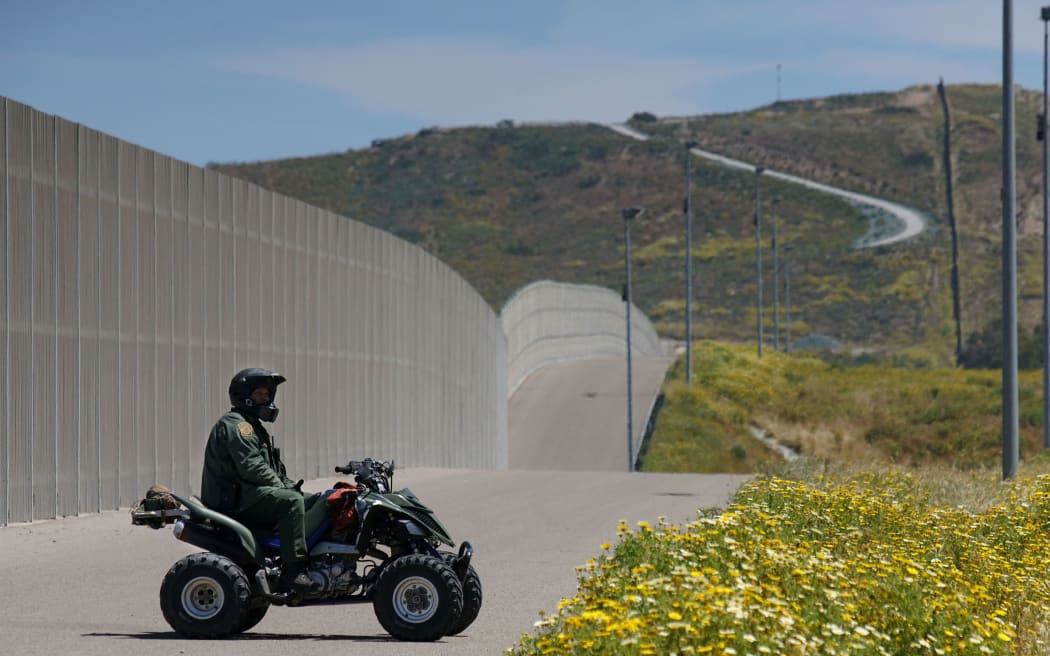 A Border Patrol agent on the US-Mexico border.